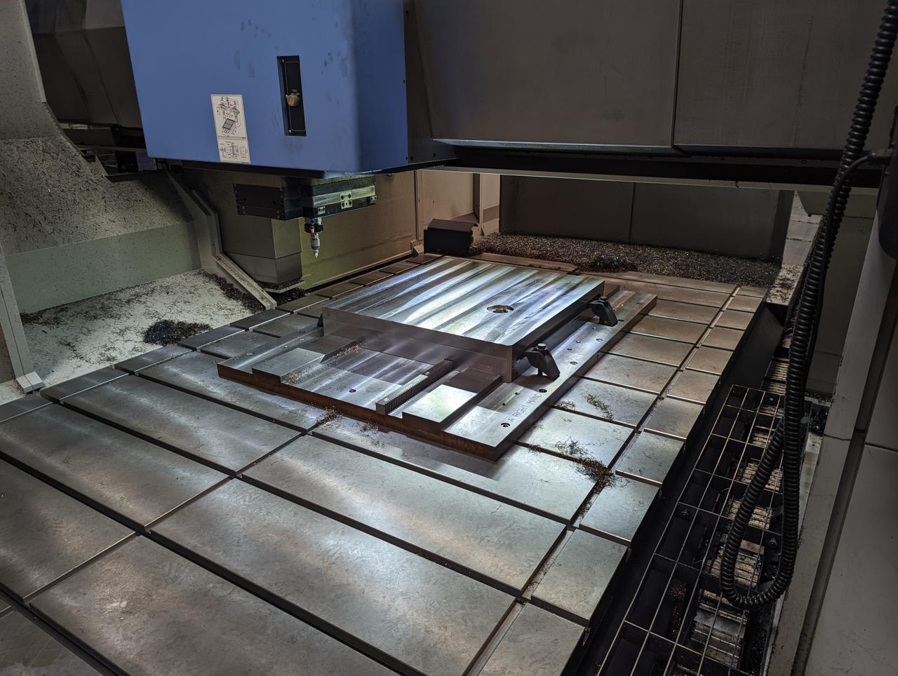 Custom CNC fixture for large-format machining of heavy steel weldments